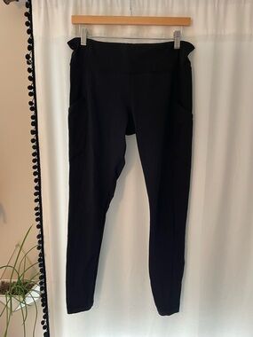 Lululemon black leggings pockets women’s size 10 back mesh panels full length